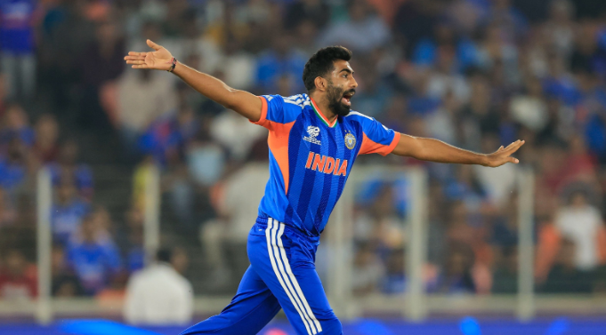 Bumrah celebrating after taking a wicket.